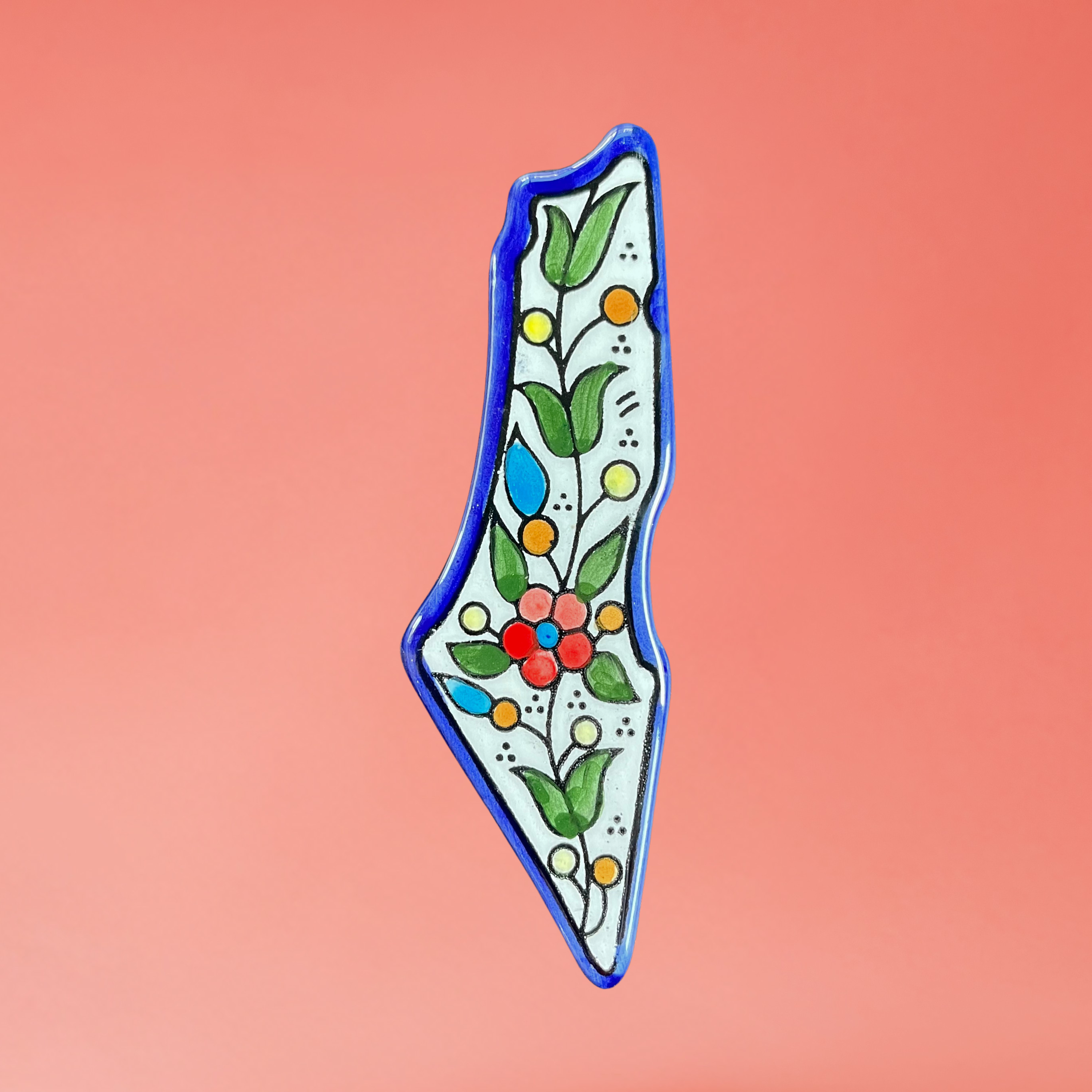 hand-painted ceramic Palestine Map fridge magnet flower design, front view on pink background