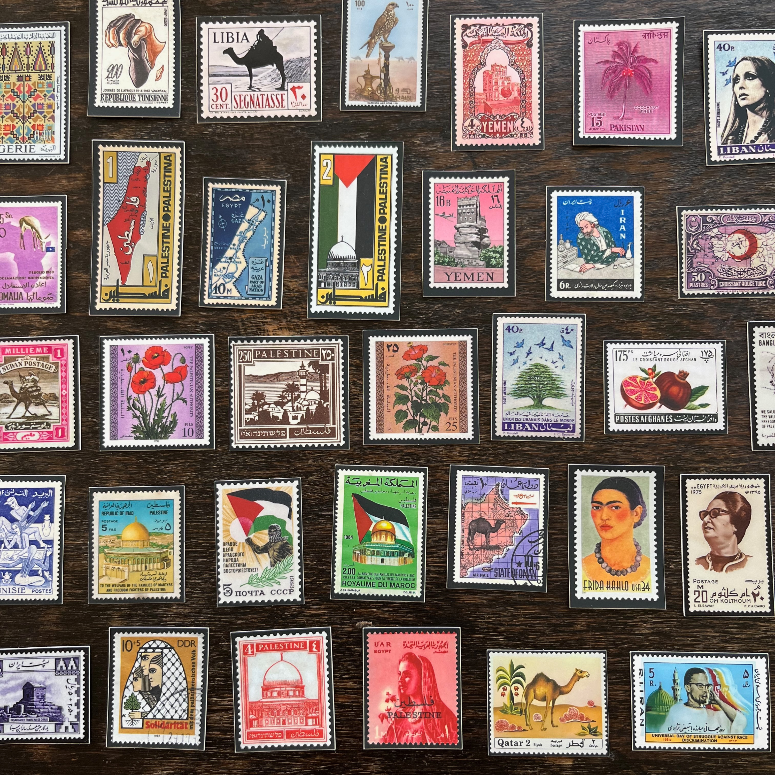 vintage palestine middle east stamp sticker collection top view