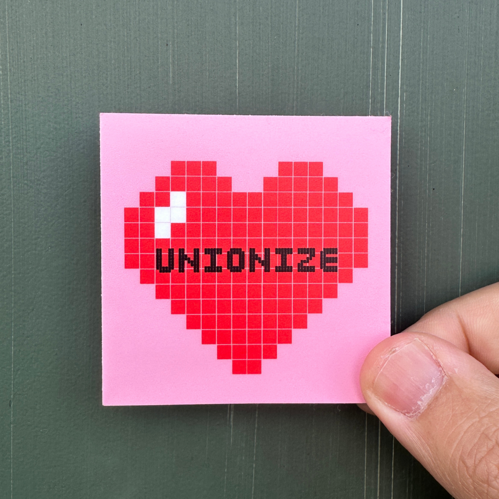 Pixelated heart with 'UNIONIZE' text on a pink background. socialist sticker