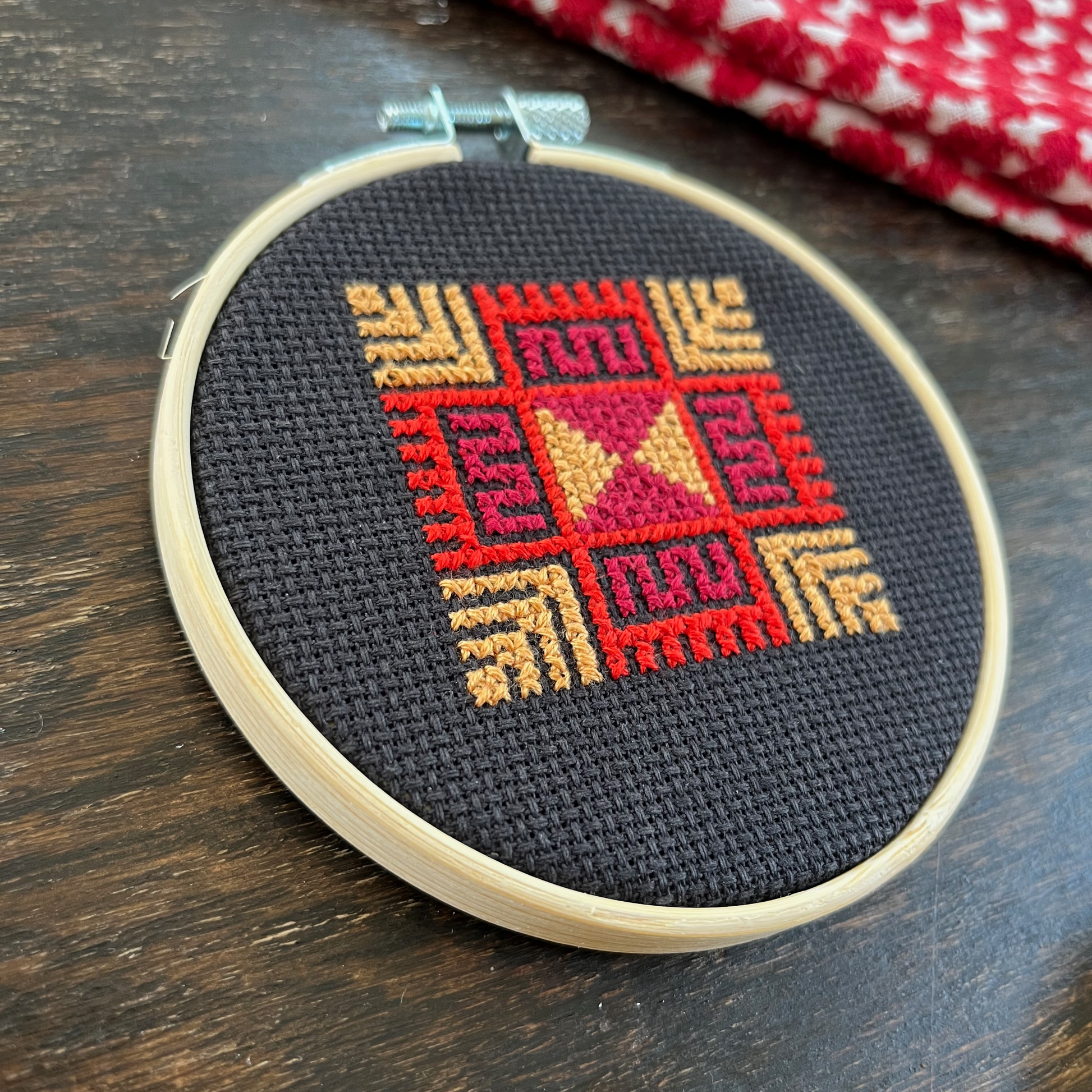 Tatreez kit with moon with feathers Palestinian tatreez design. black aida cloth, embroidery hoop, view from above