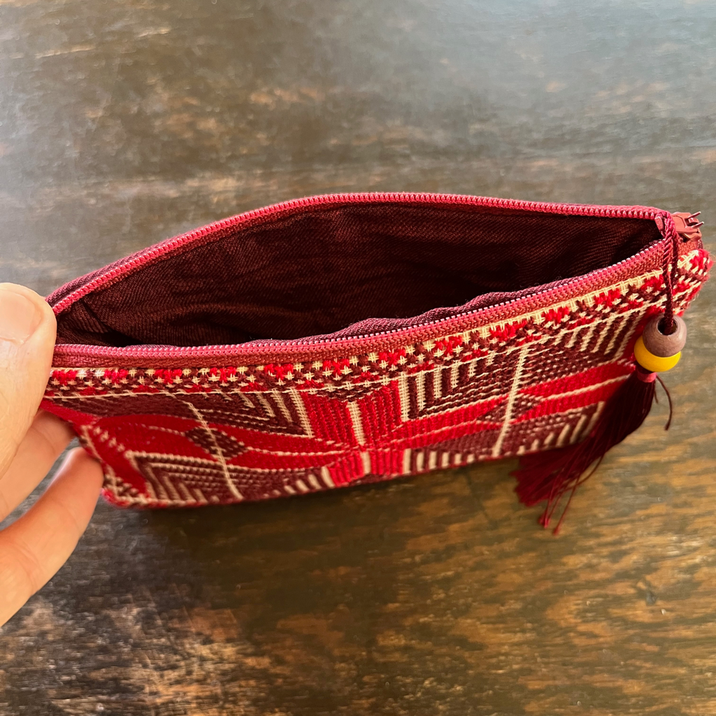 Palestinian tatreez embroidered purse/wallet/clutch bag. red and purple moon with feathers design. unzipped to see interior, view from above