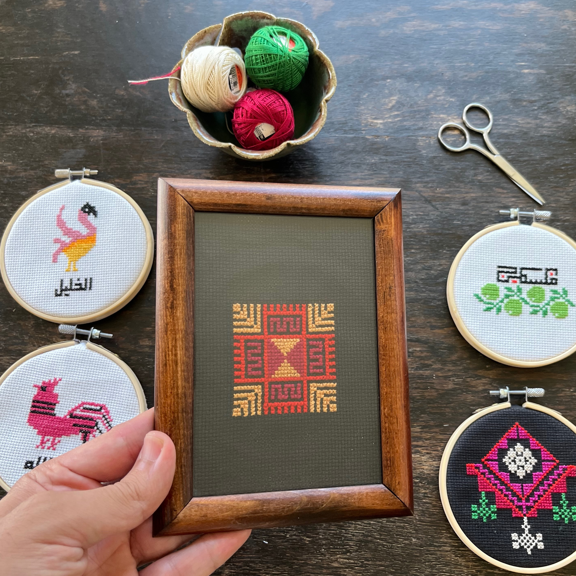 Tatreez kit with moon with feathers Palestinian tatreez design. black aida cloth, wooden frame, view from above